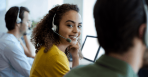 employees on the phone with headsets